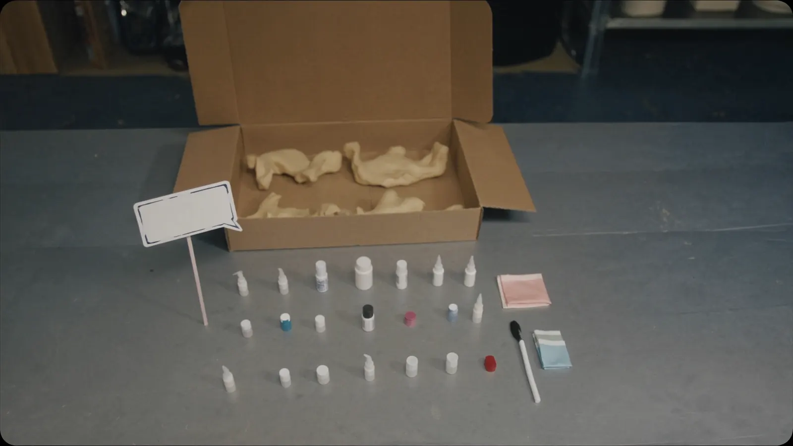 Kit components laid out beside a box