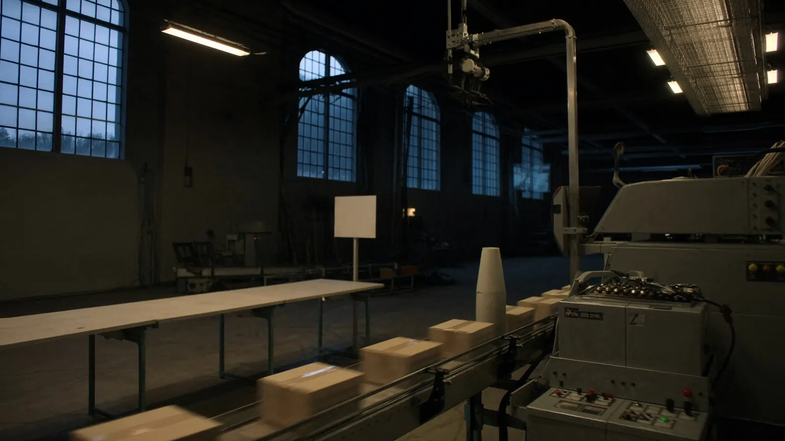 A packaging line lit up in the evening